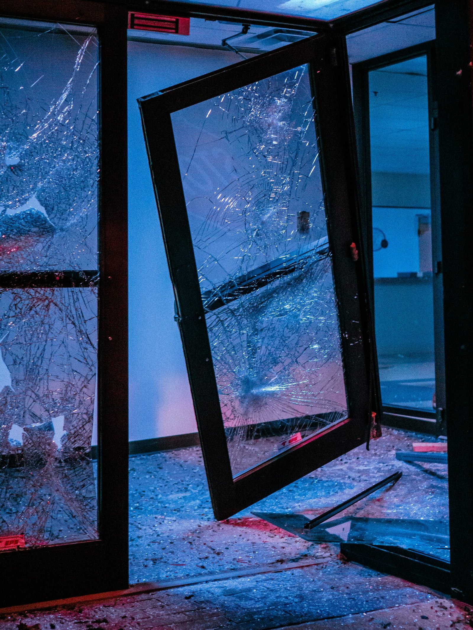 black framed glass window with white snow